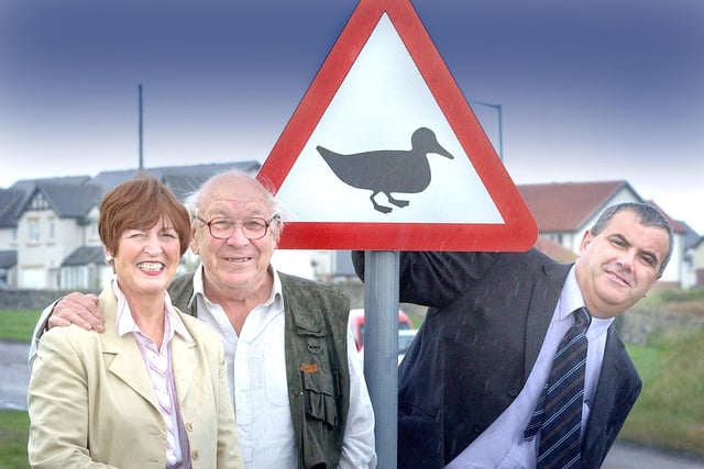 ERECTION OF DUCK SIGN AT SEAHOUSES WITH BILL WEEKS, PAT SCOTT AND RICHARD HAYES