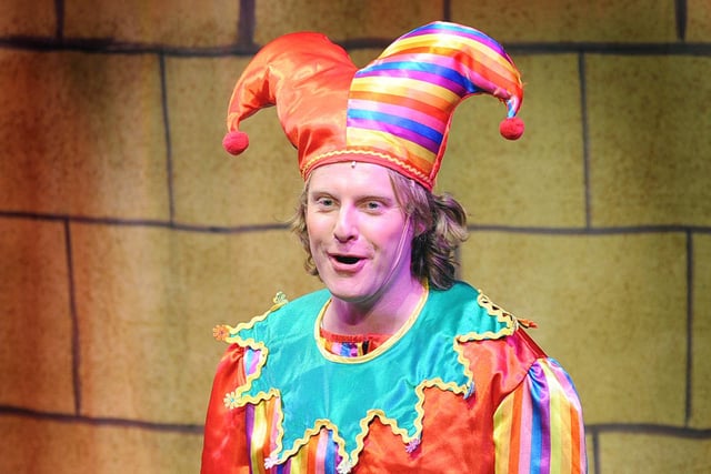 Court Jester Chuckles (Jonathan Scott) on stage during the Spittal Variety Group production of Snow White.