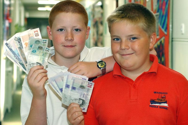 Cancer run cash from Seahouses Middle School in June 2003.