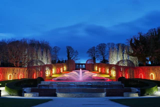 The Alnwick Garden turns red and yellow, the colours of the Northumberland flag.
