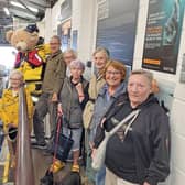 Anchor Housing mascot Charlie with Seahouses RNLI crew and Chapel Court representatives.