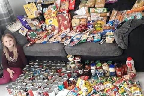 Scarlett collecting food for food banks during lockdown