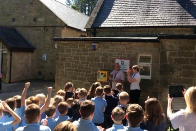 Approximately £2,500 was raised, which paid for the defibrillator and will pay for on-going training.