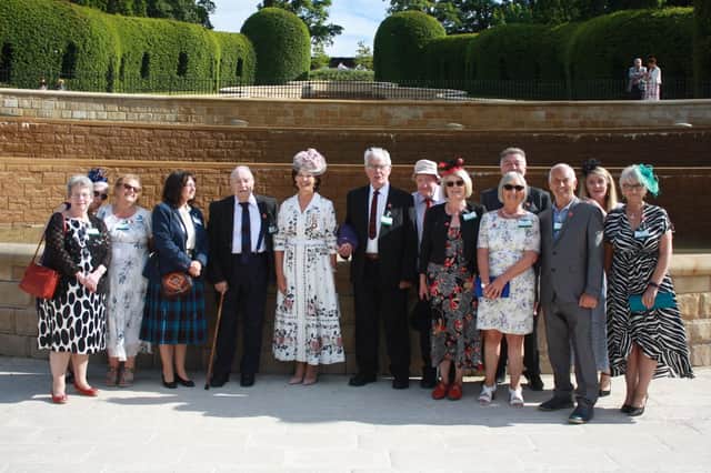 The Duchess of Northumberland presents the award to Ashington Veterans and Elders Institute representatives.