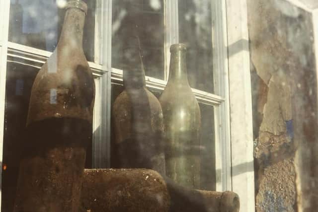 The dirty bottles which give the pub its name.