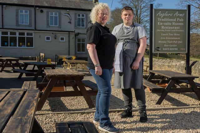 Joanne McGarry and her son, Aaron Hart, outside Anglers Arms.