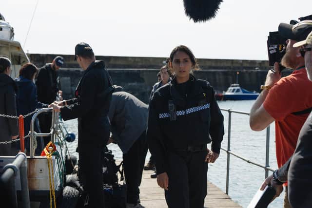 Behind the scenes as actor Anjli Mohindra films for crime drama The Red King in Craster. (Photo by Matt Towers/UKTV)