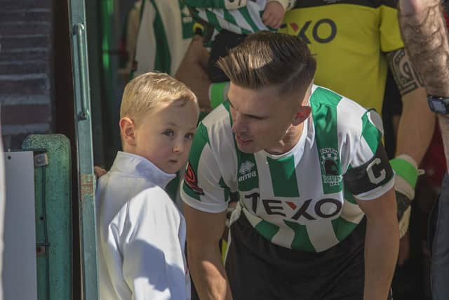 Leland with Blyth player JJ O'Donnell. Picture: Paul Scott