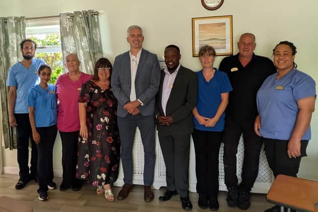 David Smith, MP for North Northumberland, with members of The Grange Nursing Home team.