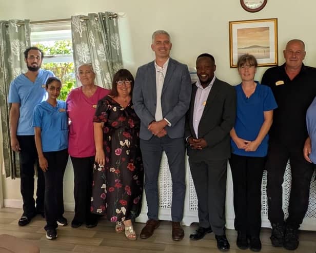 David Smith, MP for North Northumberland, with members of The Grange Nursing Home team.