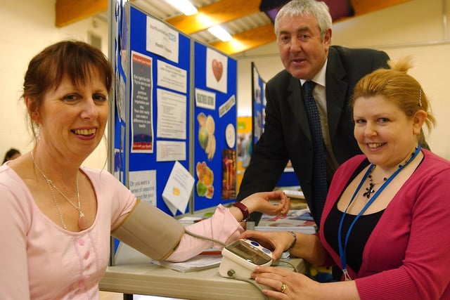 Blyth Valley Business Forum hosts event at the Isabella Centre, to help employers meet with various agencies in the area. Alexis Brown from the forum gets her blood pressure checked by Dowen Morrell, a trainer with Northumberland Healthcare Trust and Richard Water, trust vice chairman.
