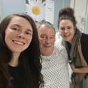 Brian Snell in hospital with daughter Millie, daughter Olivia and wife Tracey.