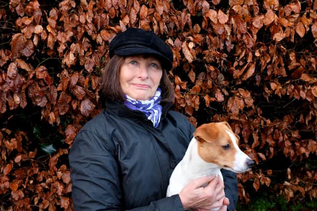 Pam Clouston receives an MBE for services to the local community. She is pictured at her Rothbury home with her dog, Riley.