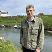 Archaeologist and broadcaster Ben Robinson in Seaton Sluice for series four of Villages by the Sea. (Photo by BBC)
