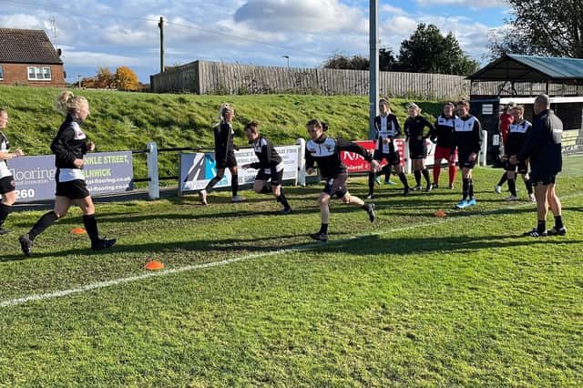 Alnwick Town Ladies warming-up prior to their excellent FA Cup win over Penrith. Picture courtesy of Alnwick Town Ladies FC