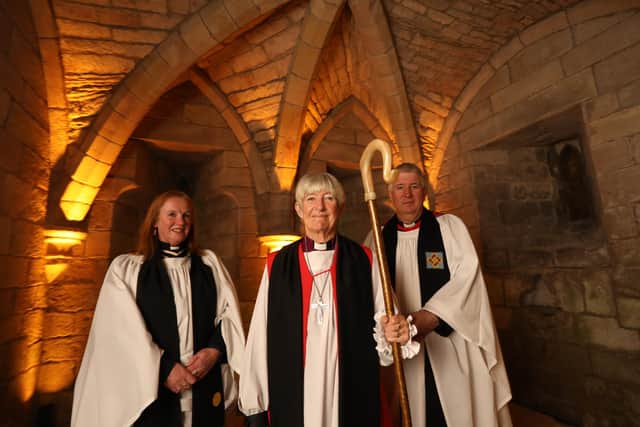 The Bishop of Newcastle with clergy at the Bamburgh crypt.