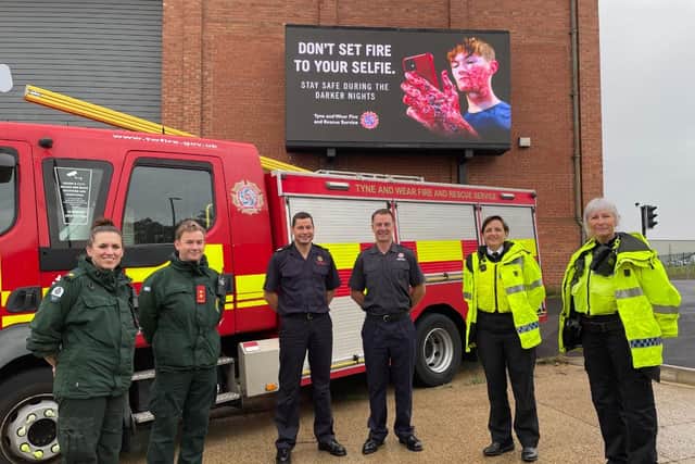 North East Ambulance Service staff Sian Price and Craig Swaddle with Tyne and Wear Fire and Rescue Service' Richie Rickaby and Northumberland Fire and Rescue Service's Joe Haustead and Northumbria Police Chief Inspector Nicola Walker and PC Julie Clazey and one of the campaign ads