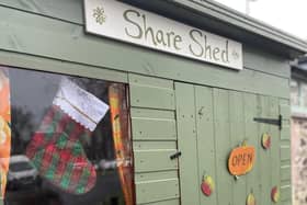 The community share shed allows people in need to collect food without seeing anyone face to face.