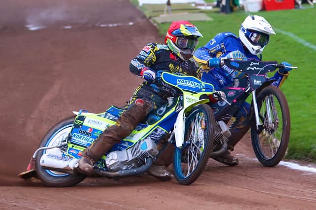 Chris Harris and Josh Pickering go wheel to wheel in the meeting at Shielfield on Saturday.