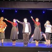 The cast of From Loch Ness With Love during a dress rehearsal.