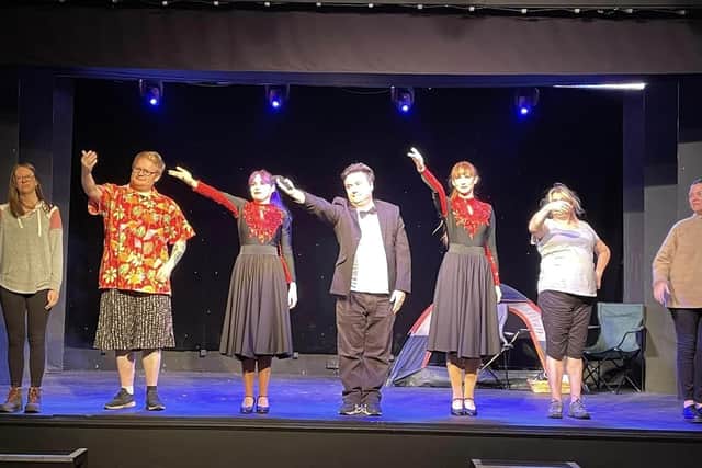 The cast of From Loch Ness With Love during a dress rehearsal.