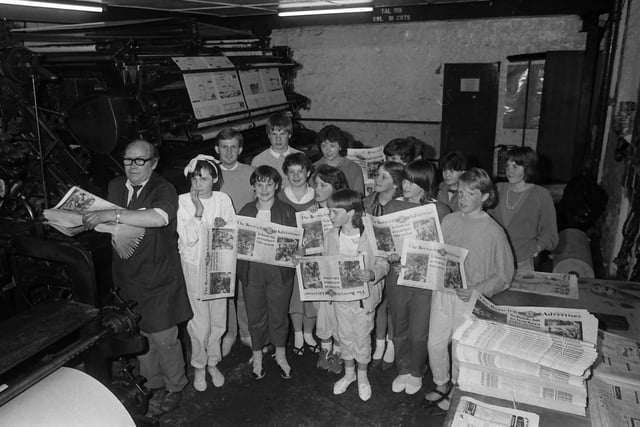 Berwick's Young Farmers Club pay a visit to the Head Office of the Tweeddale Press Group. Alan Newton was able to supply them with copies of the 'Berwick Advertiser' hot off the press.