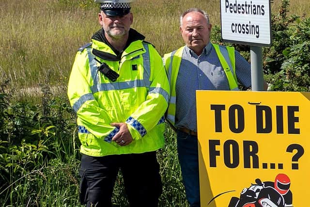 More than 100 motorcycle safety signs have been put up across Northumberland.