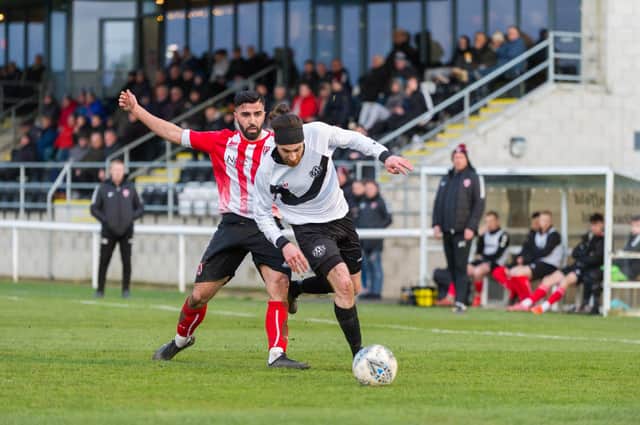 Luke Salmon in action for Ashington v Guisborough - he was sent off later in the game. Picture by Ian Brodie.