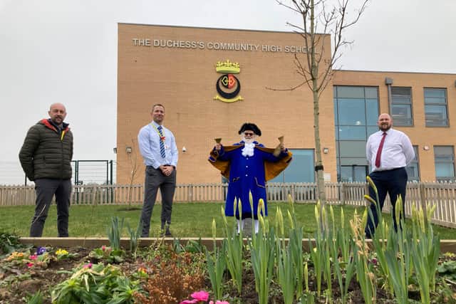 Town crier Roger Daniel with Mike Skinner of Duchess High School Trust, left, and co-heads Alan Rogers and James Wilson. Picture: Ian McAllister