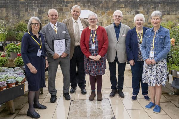 Judges Dale Hector and Brendan Mowforth with Alnwick in Bloom and Alnwick Town Council representatives Jenny MacDowell, Janet Pibworth, Tom Pattinson, Kathleen Bradford and Liz Adams. Picture: Jane Coltman