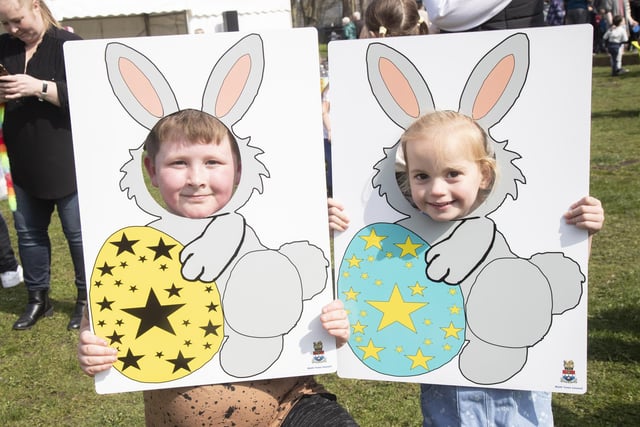 Two youngsters enjoying themselves at the party and egg hunt.