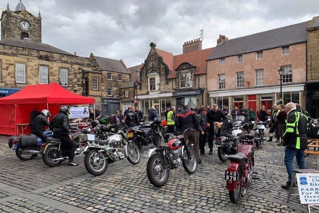 Vintage motorbikes on display.