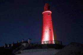 St Mary's Lighthouse will be bathed in red to support anti racism group.