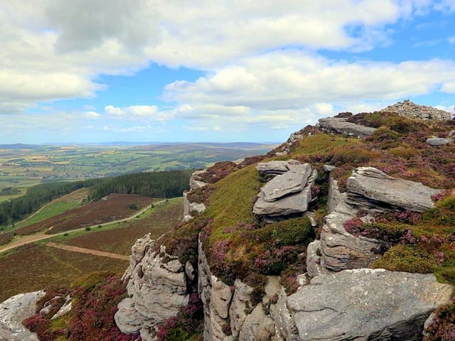 Simonside stands guard above Rothbury with its distinctive ridge and craggy profile. At the top, you have a 360 degree view encompassing the Cheviot Hills and North Sea coastline, teeming with .wildlife in the forests below. A walk along the Simonside Hills must not be missed.