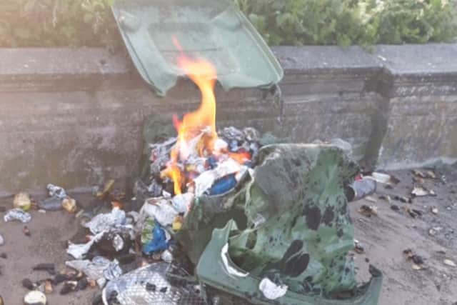 A wheelie bin that caught fire on Blyth Beach. Picture: Mary Baxter