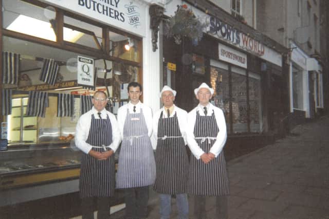 Roger, Mark, John and Peter outside the Market Street shop.