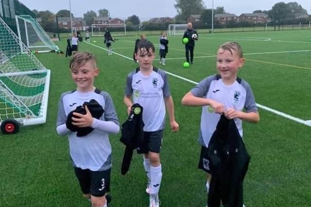 Youngsters at Blyth Spartans Juniors enjoy their new all-weather football pitch.