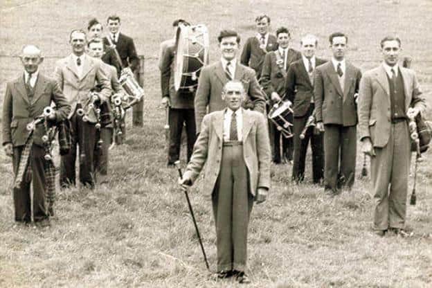 The Rothbury Highland Pipe Band pictured in 1955.