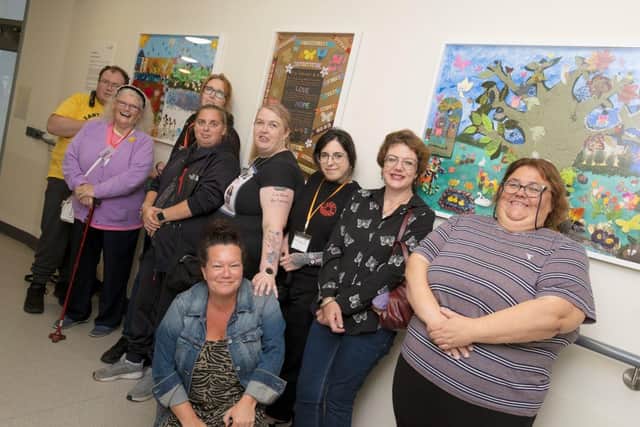 Northern Butterflies members with their exhibition, now on display in the hospital. (Photo by Northumbria Healthcare)