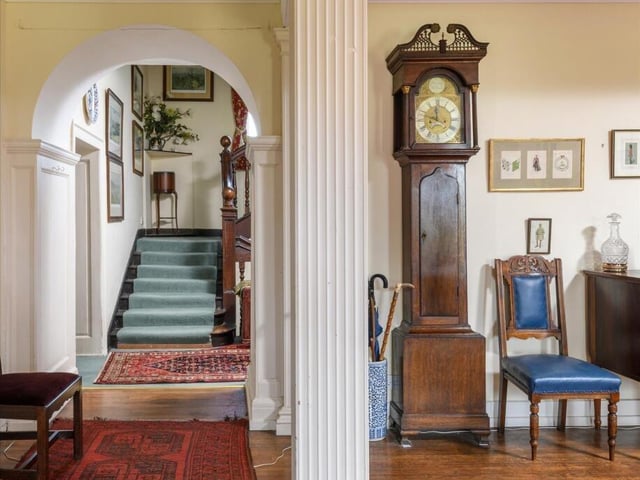 The reception hall provides an impressive point of arrival and leads to the principal entertaining spaces.