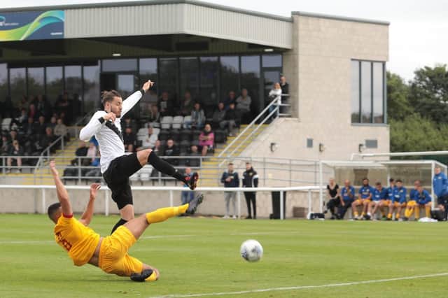 Action from Ashington v Newcastle Benfield in the FA Cup on Saturday. Picture by Keith Saint.