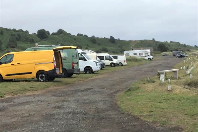 Campervans parked at Alnmouth beach.