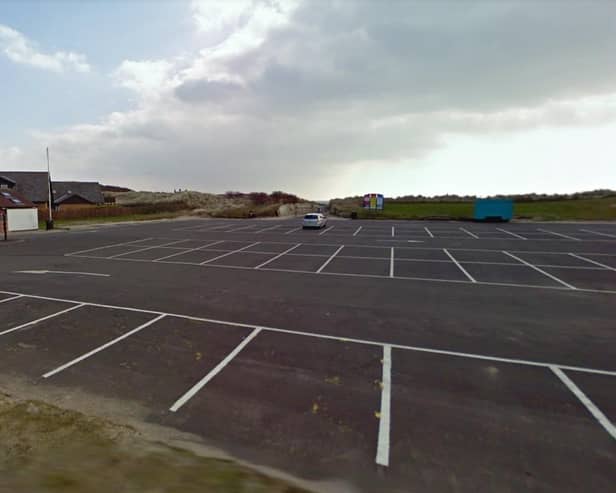 Beadnell beach toilets and car park.