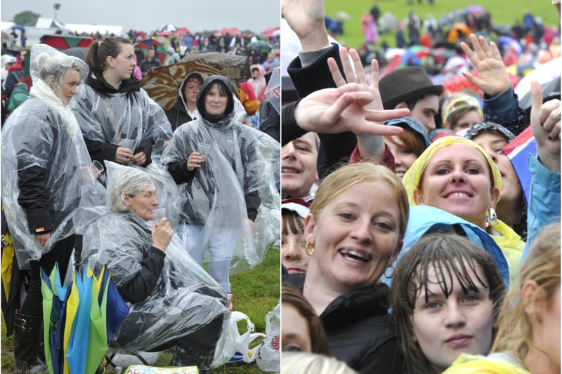 Determined to have a good time whatever the weather at the Jessie J concert in the Pastures beneath Alnwick Castle on Saturday, August 25, 2012.