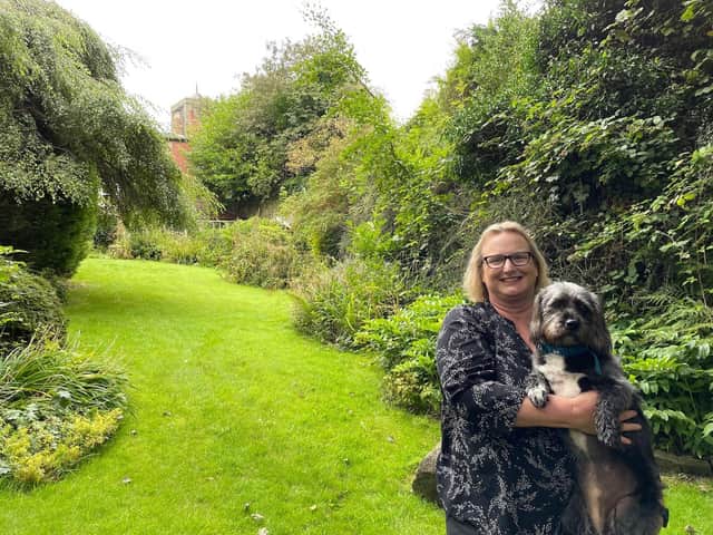 Sue Shaw-Toomey in her gorgeous garden.