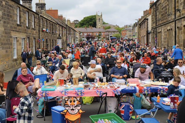 Belford High Street was packed for a street party.