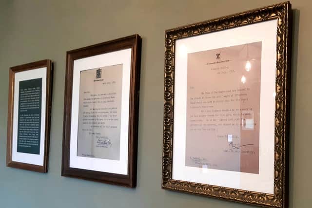Rena's Country Kitchen's display of historical royal letters.