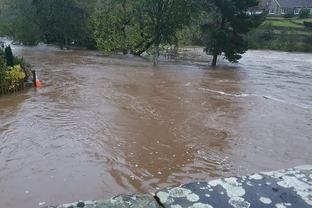 The River Coquet burst its banks in Rothbury.