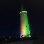 St Mary's Lighthouse lit in rainbow colours for LGBT+ History Month.