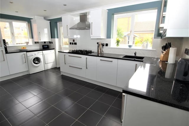 The kitchen is furnished with a comprehensive range of modern wall and floor mounted units plus fully integrated appliances and access to the ground floor wc and rear garden.